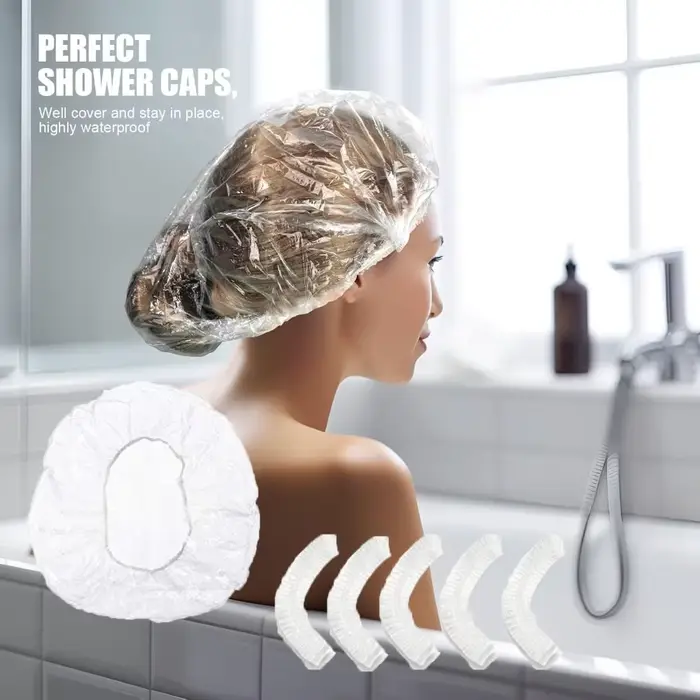 100/200 pièces de bonnets de douche jetables transparents