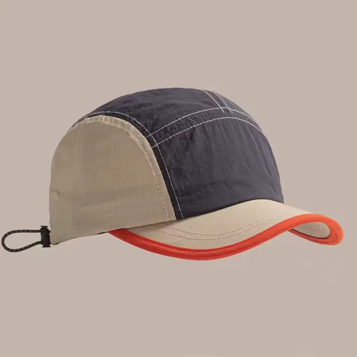 Une casquette à bord court pour hommes, nouveau style d'été, chapeau de baseball respirant et à séch